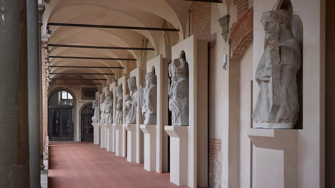 Cloister courtyard with statues in Opera Del Duomo Museum, Florence.