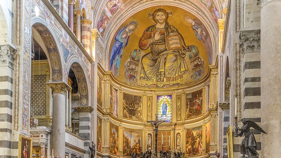 Frescoes depicting religious scenes inside Pisa Cathedral, Italy.
