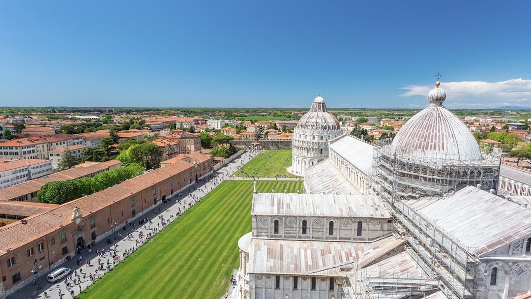 Panoramic view of Pisa Cathedral and surrounding cityscape from Leaning Tower.