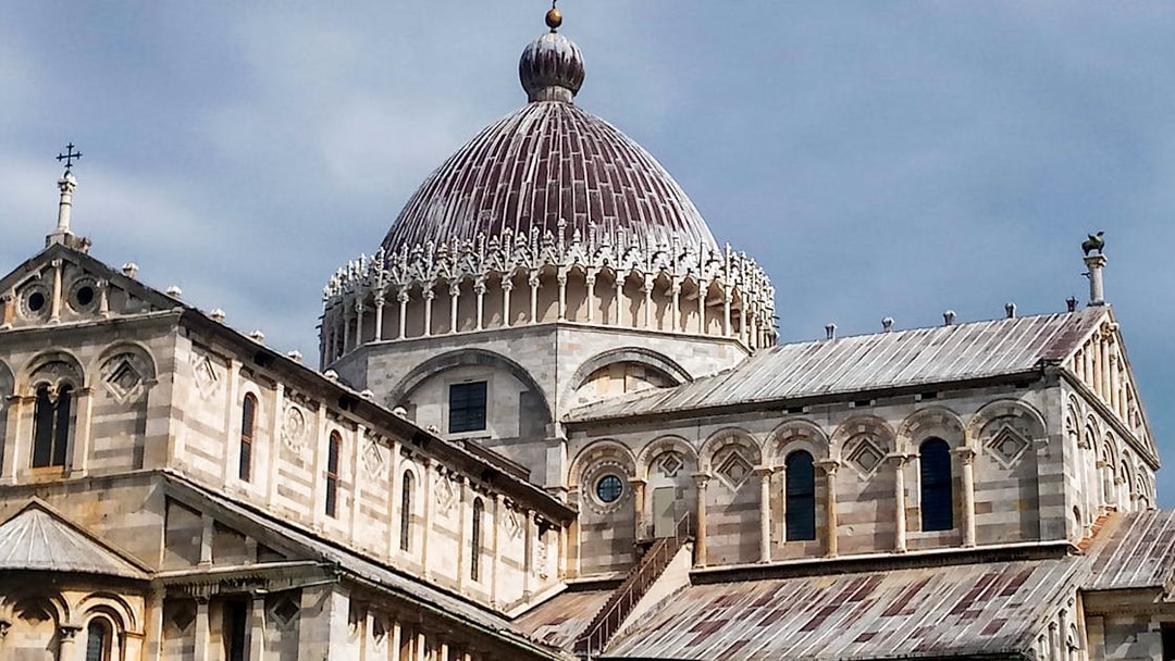 Pisa Cathedral dome and facade on a guided walking tour with skip-the-line access.