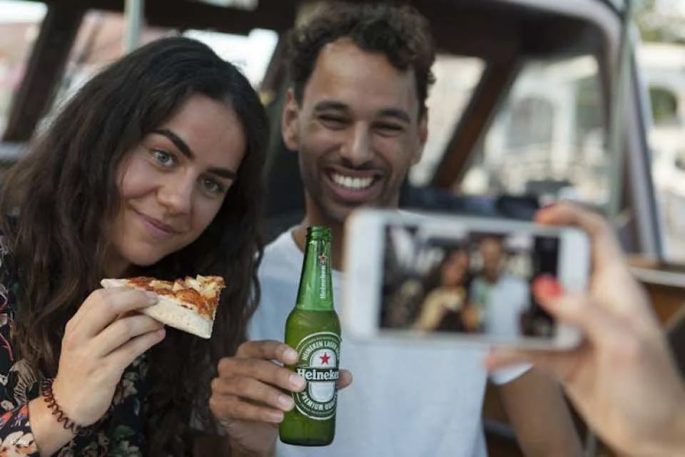 Pizza canal cruise in Amsterdam