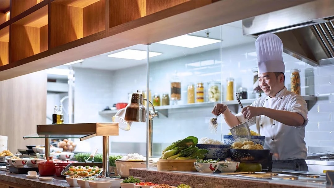 Chef preparing noodles at Plaza Premium Lounge, KLIA Terminal 1.