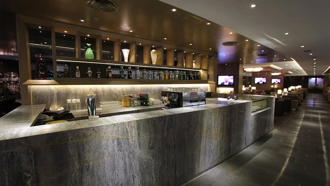 Bar area at Plaza Premium First lounge, Satellite Terminal, with drinks and seating.