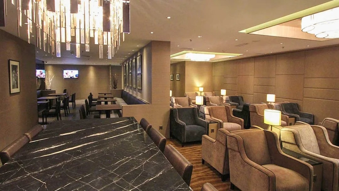 Plaza Premium Lounge seating area with modern decor and ambient lighting.