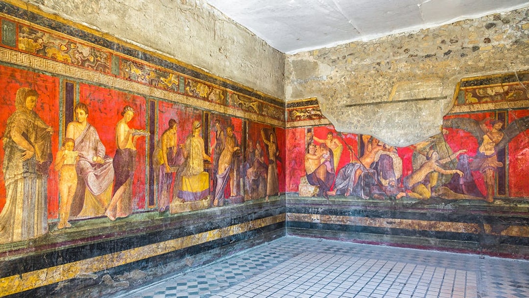 Frescoes in the Villa of the Mysteries, Pompeii, Italy, depicting ancient Roman life.