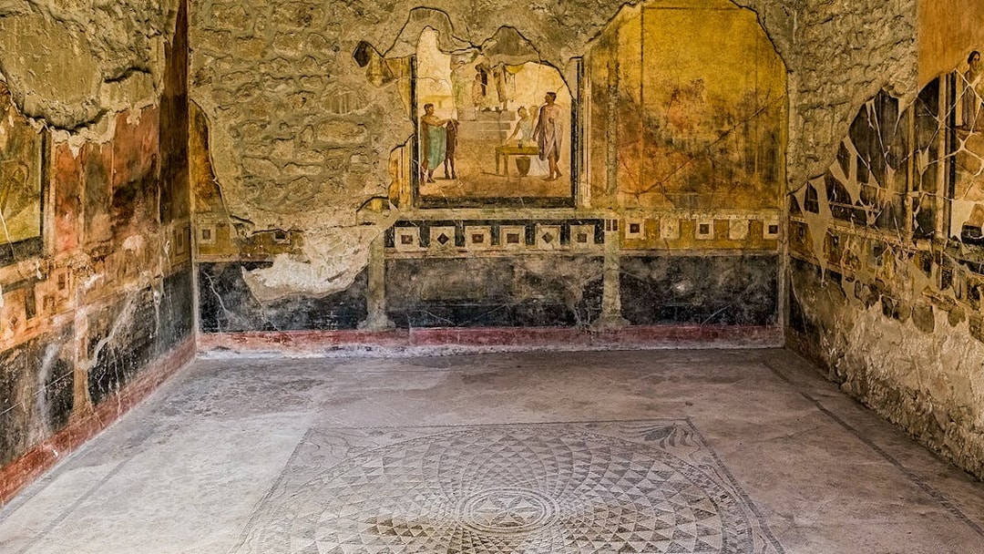 Frescoes and mosaic floor in the Samnite House, Pompeii.