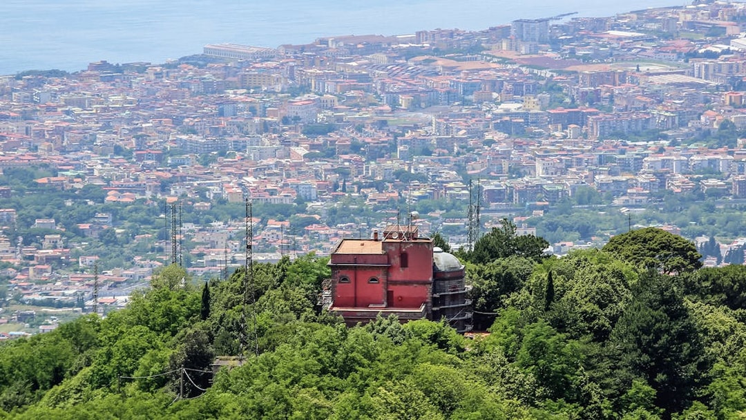 Observatory at Mount Vesuvius overlooking Naples cityscape.