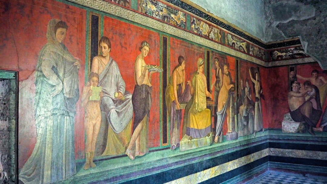 Mural depicting figures in a room inside a house in Pompeii, Naples.