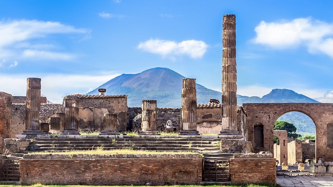 Ruins of Pompeii with Mount Vesuvius in the background.