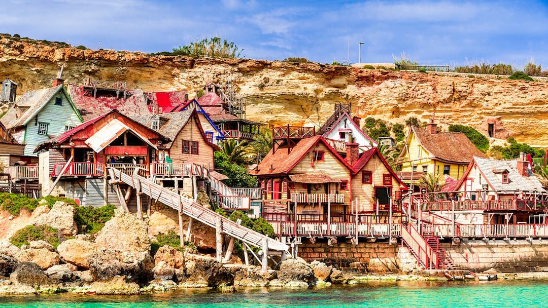 Popeye Village colorful wooden houses by the sea in Malta.