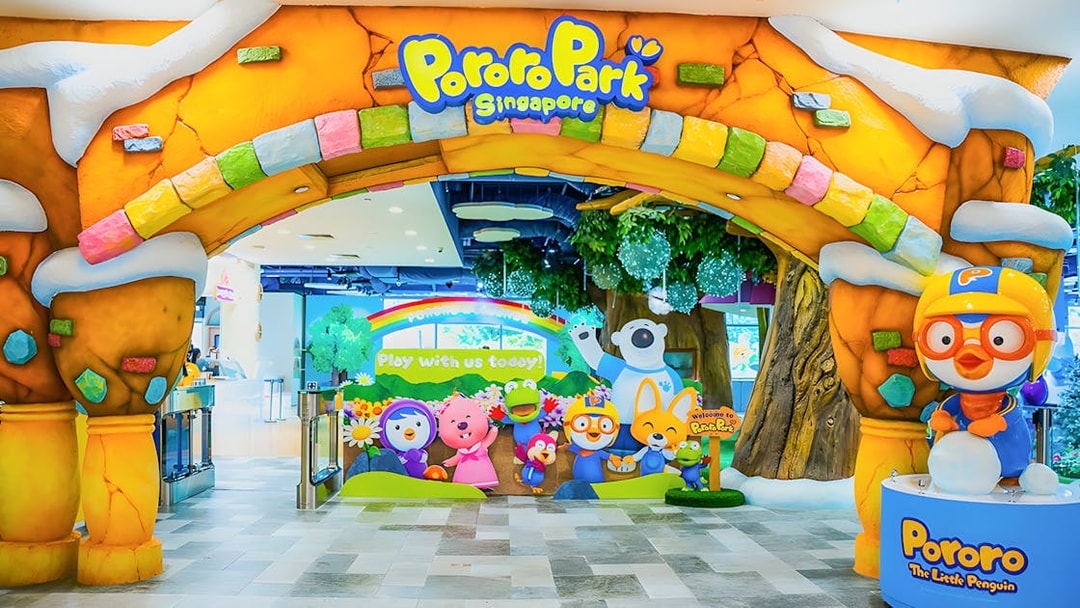 Entrance to Pororo Park Singapore with colorful characters and playful decor.