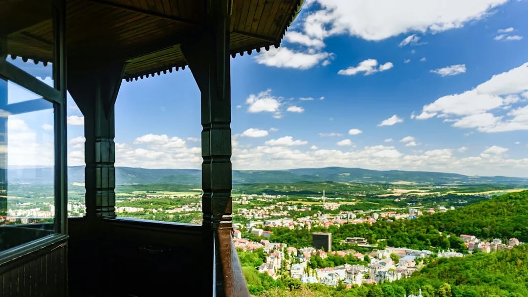 View from Watchtower Diana overlooking Karlovy Vary landscape on a day trip from Prague.