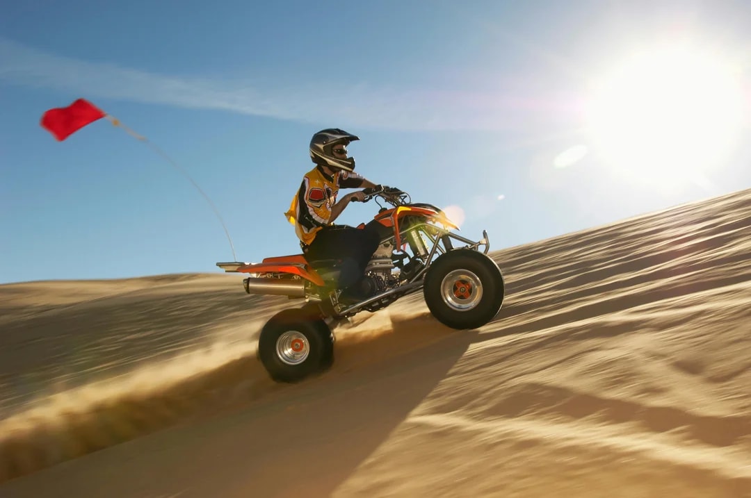 Premium Doha Desert Safari with Dune Bashing, Sandboarding, Camel Ride, Quad Biking & Inland Sea Image 11