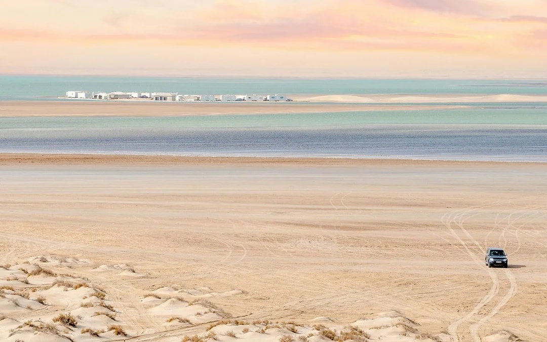 Premium Doha Desert Safari with Dune Bashing, Sandboarding, Camel Ride, Quad Biking & Inland Sea Image 4