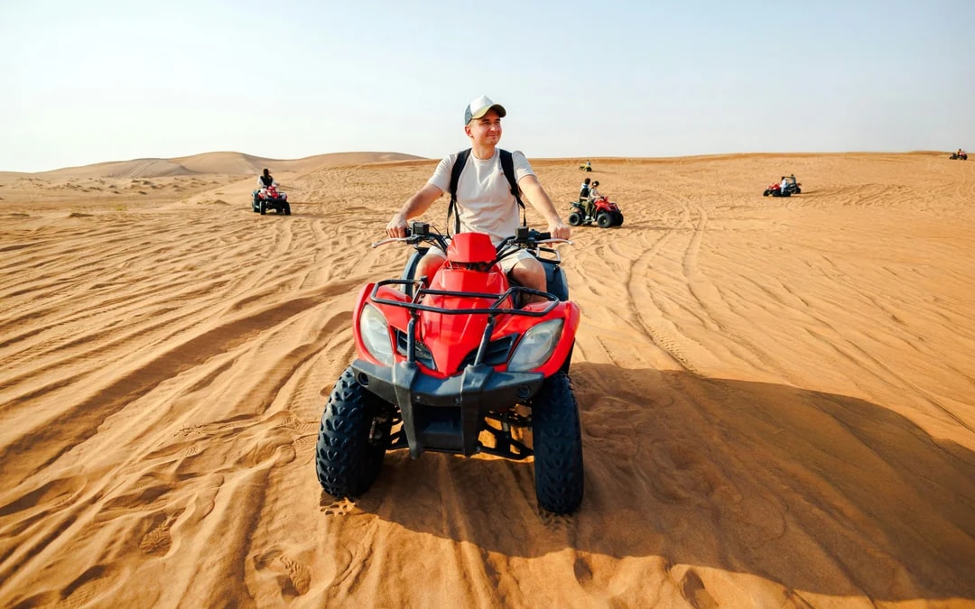 Premium Doha Desert Safari with Dune Bashing, Sandboarding, Camel Ride, Quad Biking & Inland Sea Image 7