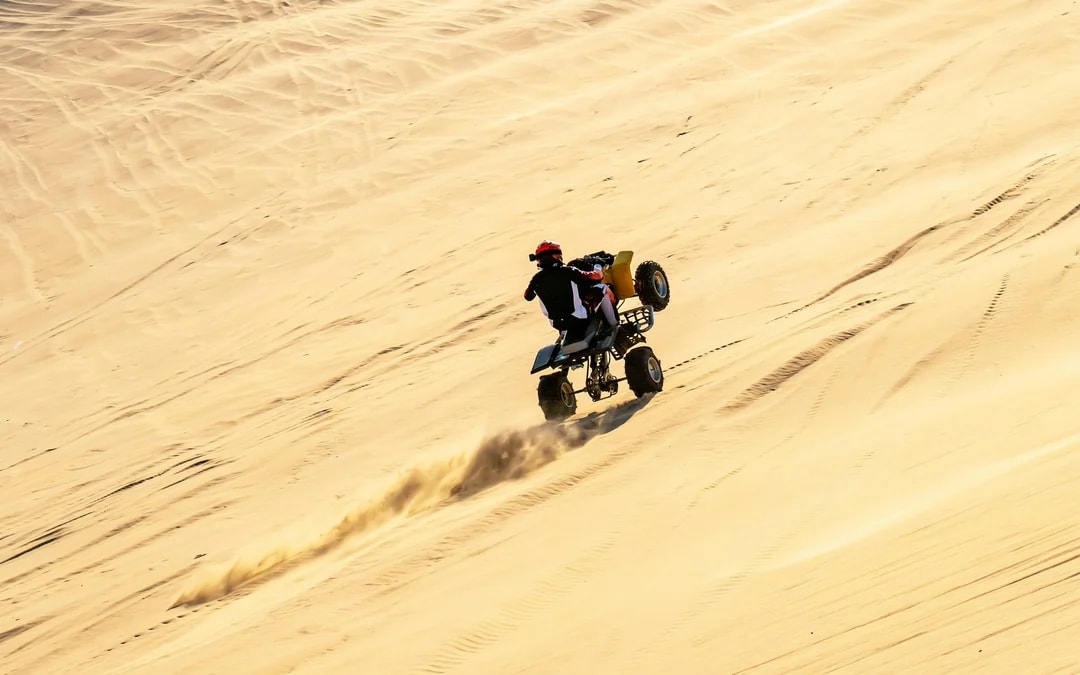 Premium Doha Desert Safari with Dune Bashing, Sandboarding, Camel Ride, Quad Biking & Inland Sea Image 8