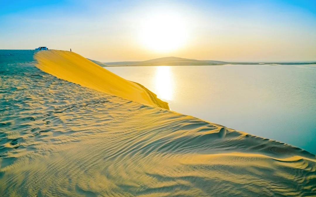 Premium Doha Desert Safari with Dune Bashing, Sandboarding, Camel Ride, Quad Biking & Inland Sea Image 9