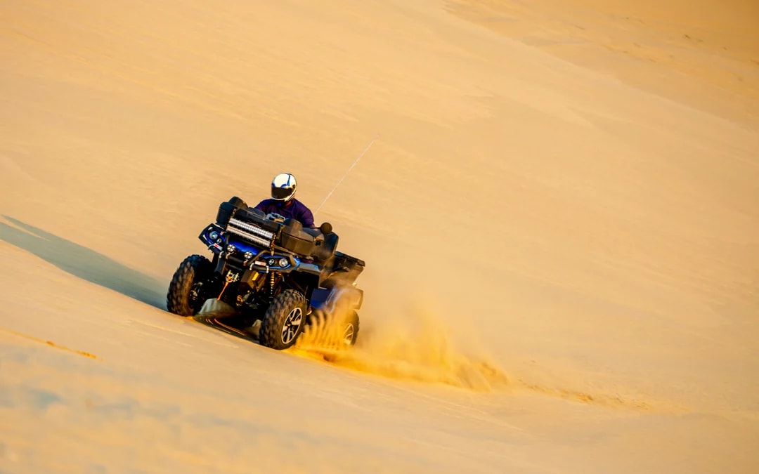 Premium Doha Desert Safari with Dune Bashing, Sandboarding, Camel Ride, Quad Biking & Inland Sea Image 10