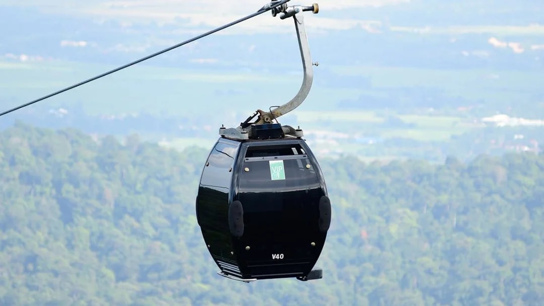 VIP gondola on Langkawi cable car with forest view.