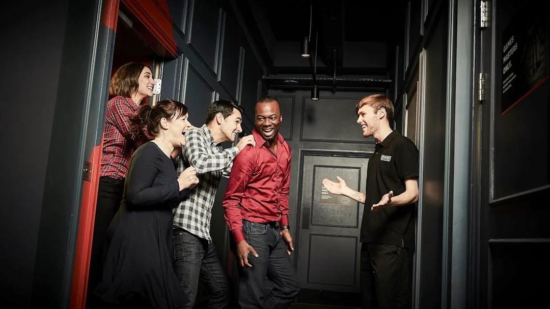 Group of friends enjoying Jack The Ripper Escape Room in Dubai.