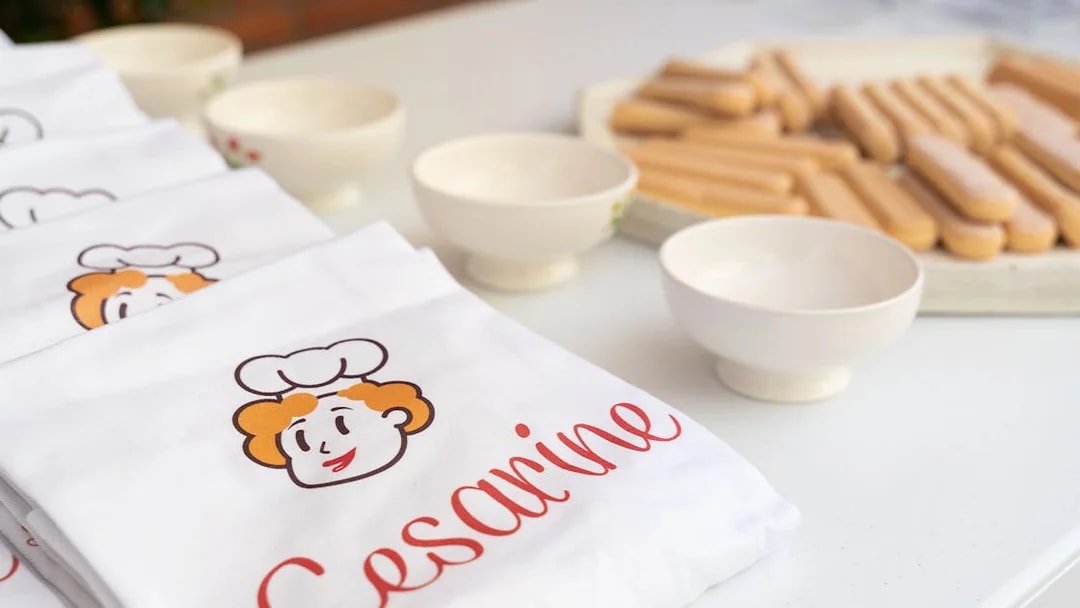 Aprons and ingredients for a private cooking class in Bologna.