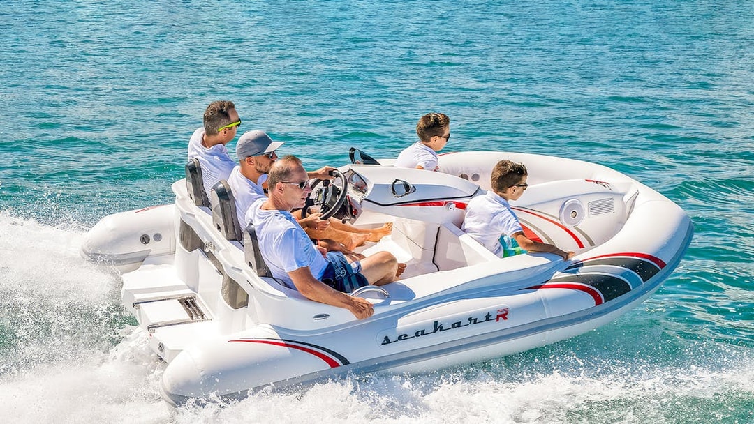 Group enjoying a self-drive boat tour on Dubai waters.