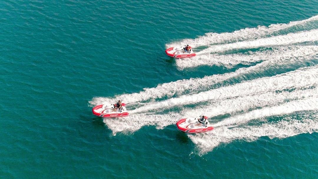 Seakart jet skis racing on blue waters in Dubai.