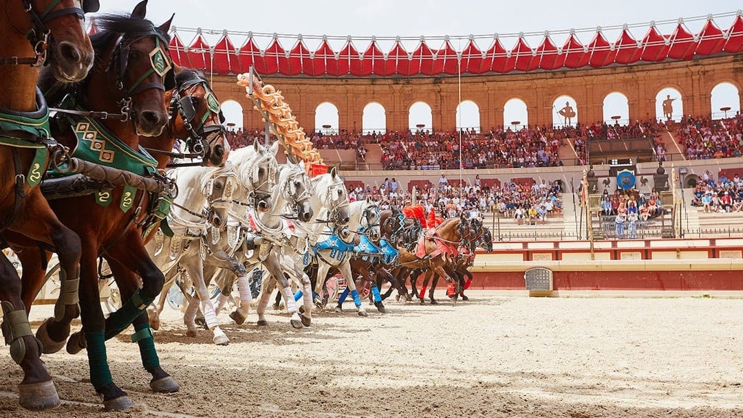 Horses in a Puy du Fou arena during a Viking-themed show.