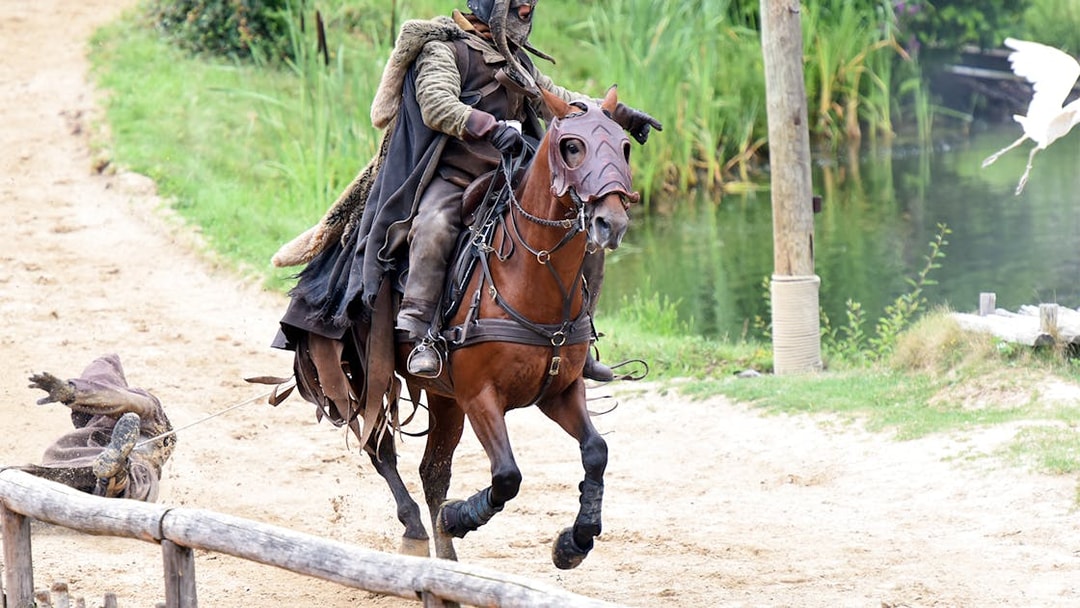 Medieval knight on horseback at Puy du Fou Theme Park.