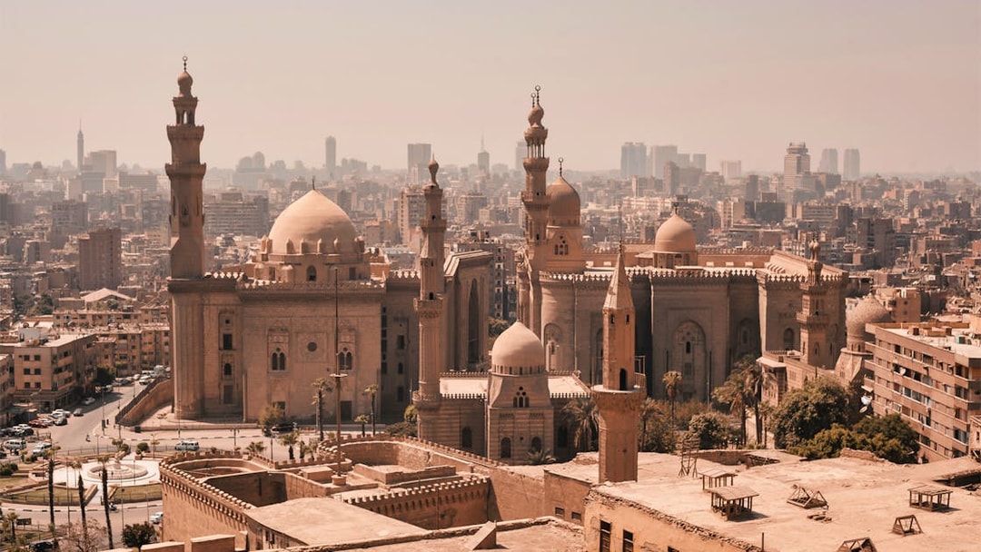 Cairo skyline with historic mosques and citadel, part of Pyramids, Bazaar and Citadel Tour.