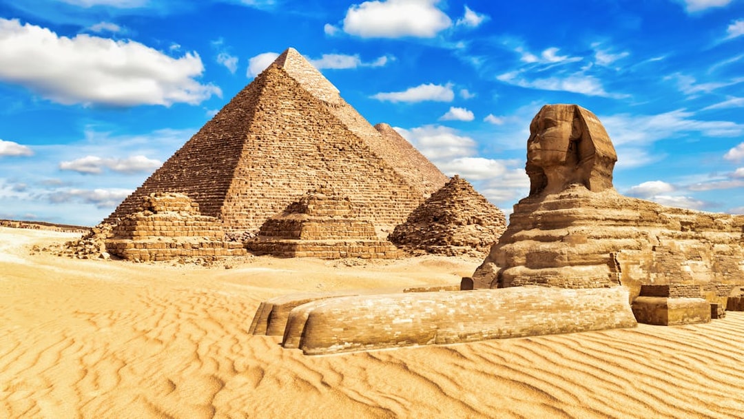 Pyramids and Sphinx in Giza, Egypt, site of private quad and camel ride tour.