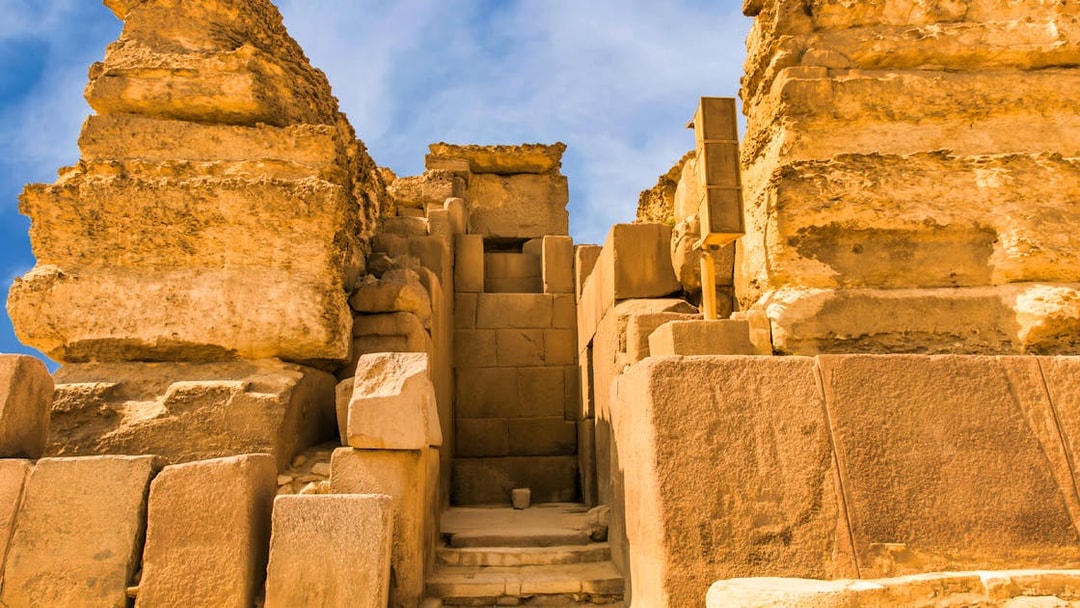 Ancient stone structure at the Pyramids, Egypt, part of a private quad and camel ride tour.