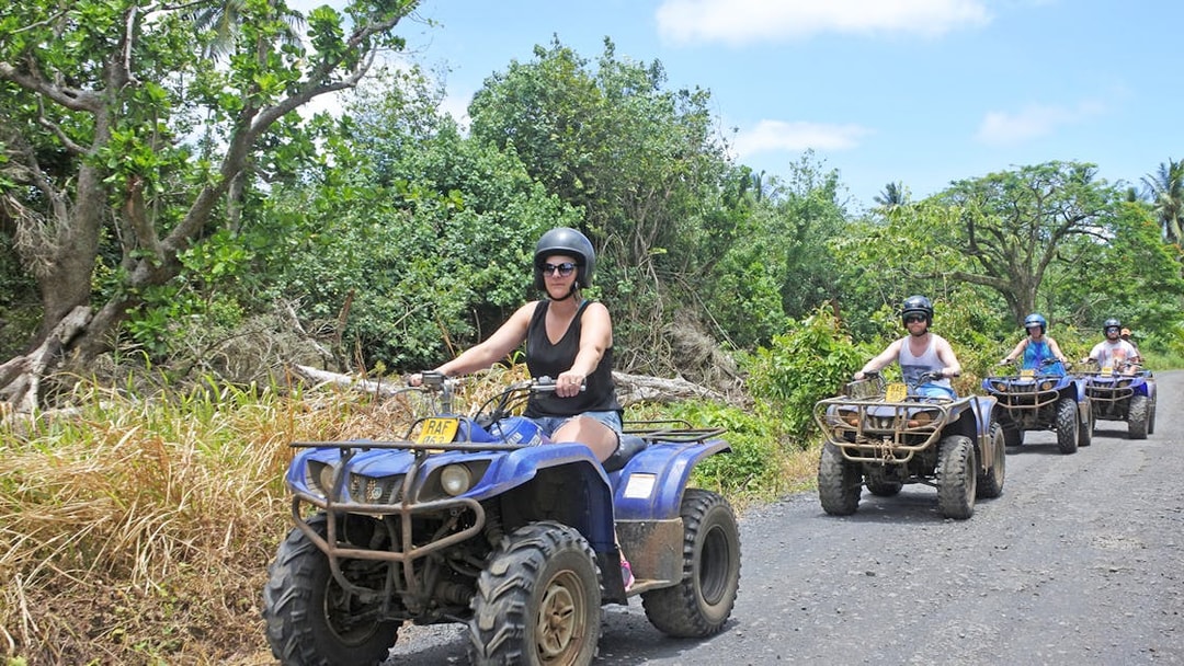 Quad biking group on a forest trail during Antalya safari experience.