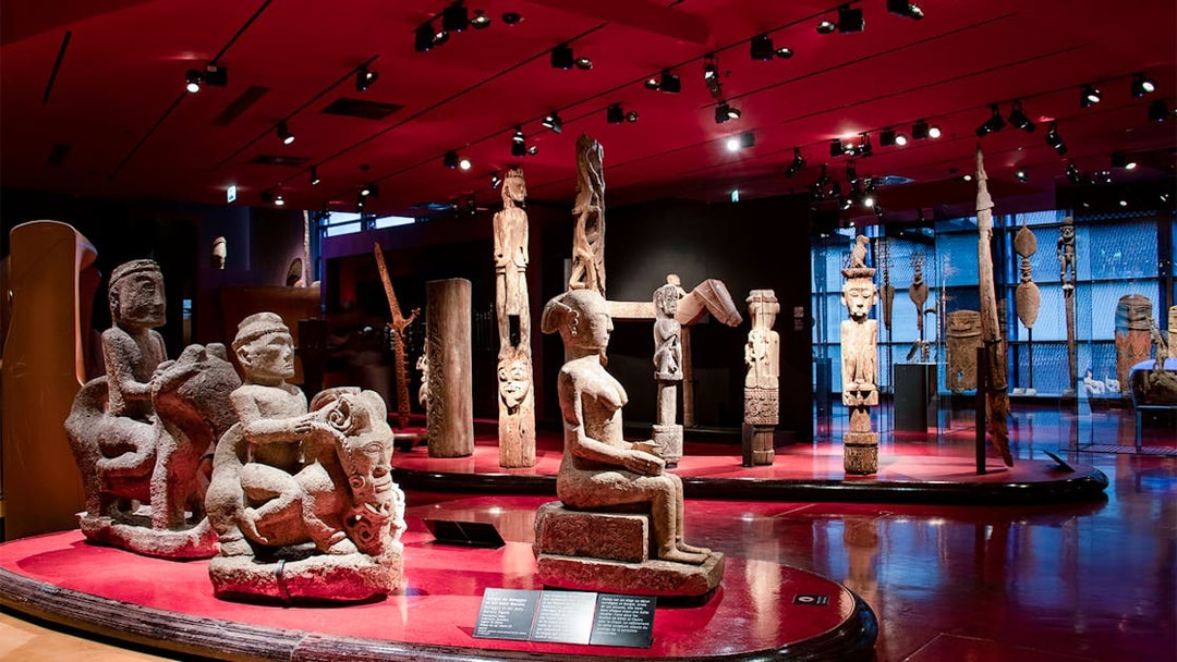 Sculptures and artifacts displayed at Musee du Quai Branly, Paris.