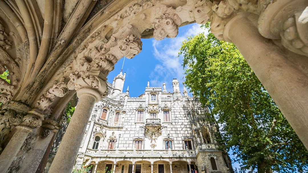 Quinta da Regaleira's ornate architecture and lush gardens in Sintra, Portugal.
