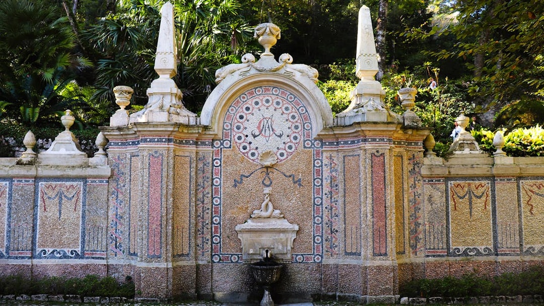 Quinta da Regaleira ornate stone fountain in Sintra, Portugal.