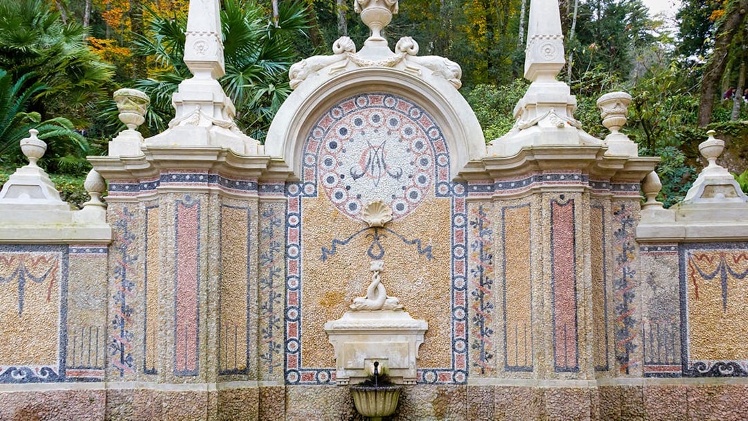 Abundance Fountain with intricate mosaic at Quinta da Regaleira, Sintra, Portugal.