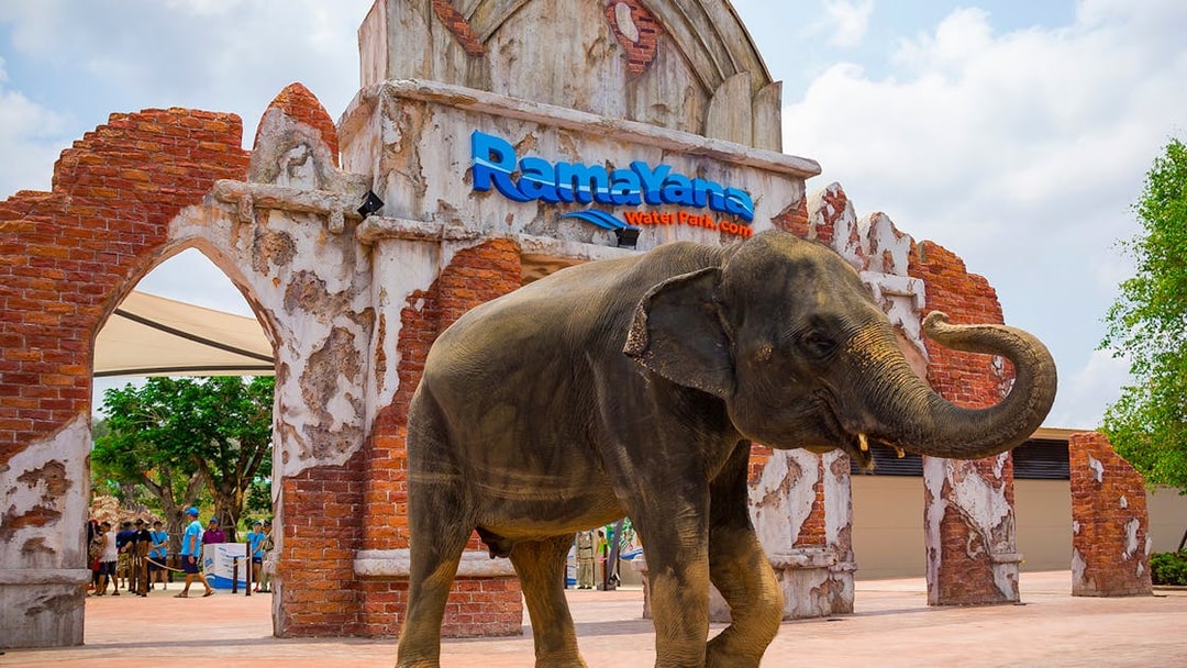 Elephant standing at the entrance of Ramayana Water Park, Thailand.