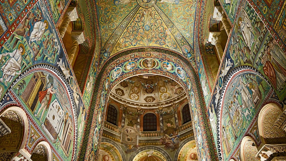 Intricate mosaics inside Basilica di San Vitale, Ravenna, Italy, showcasing vibrant religious scenes.