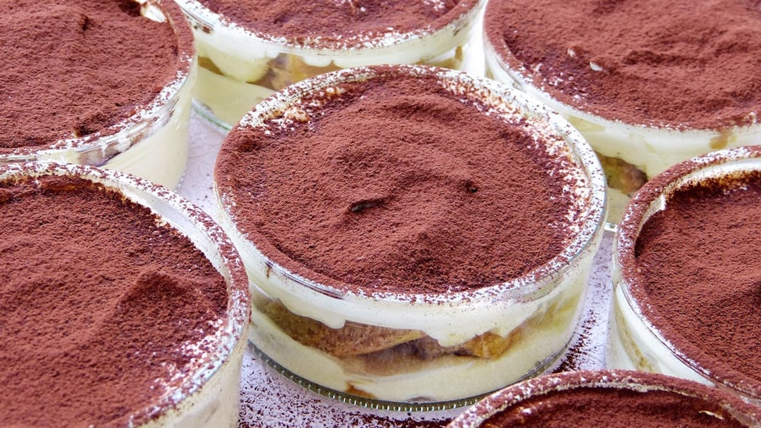 Tiramisu desserts prepared in a masterclass near the Colosseum.