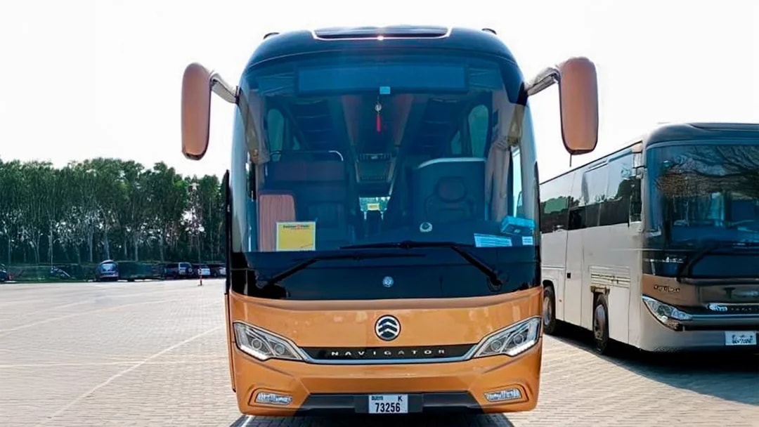 Tour bus parked at Aquaventure Waterpark, Dubai.