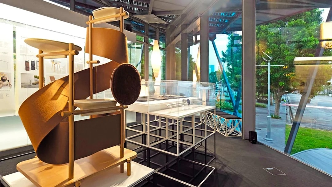 Exhibit inside Red Dot Design Museum Singapore with modern art display.