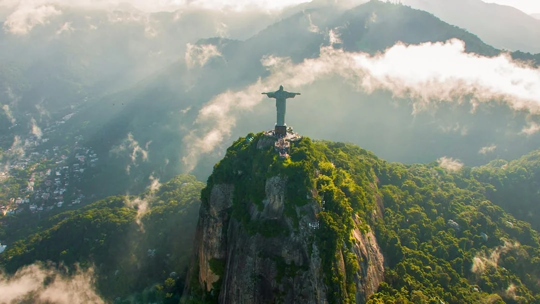 Aerial view of Christ the Redeemer in Rio de Janeiro during helicopter tour.