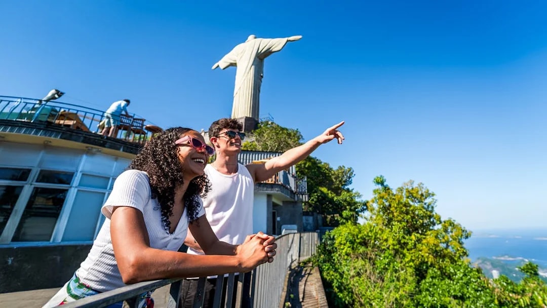 Guests enjoying the view at Christ the Redeemer statue, Rio de Janeiro.