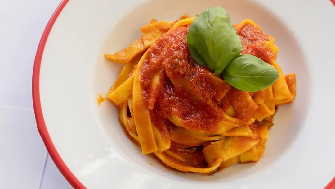 Fettuccine with tomato sauce and basil, part of a Rome cooking class near Navona.