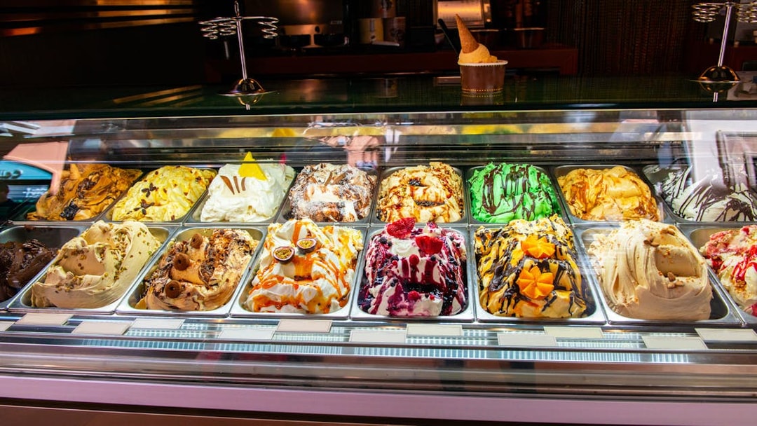 Assorted gelato flavors in a display case during Trastevere and Jewish Ghetto food tour.