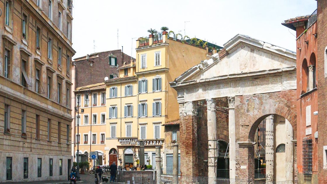 Portico of Octavia in Rome's Jewish Ghetto with surrounding historic buildings.