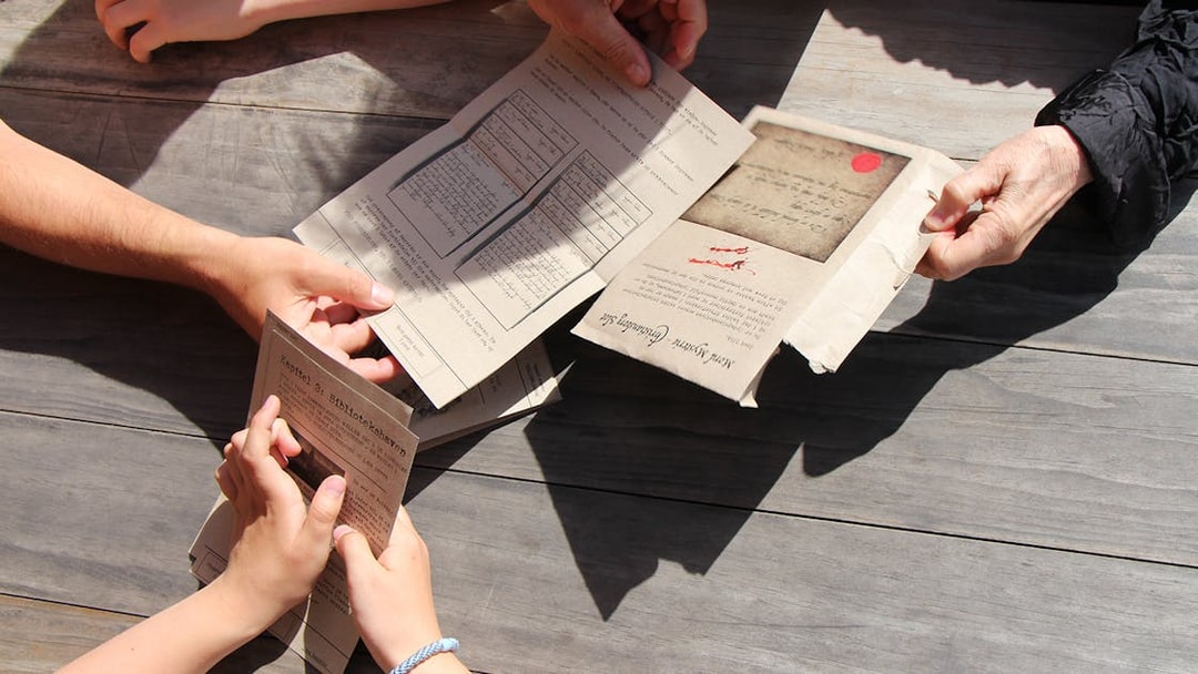 Participants examining clues for Murder Mystery at Round Tower, Copenhagen.