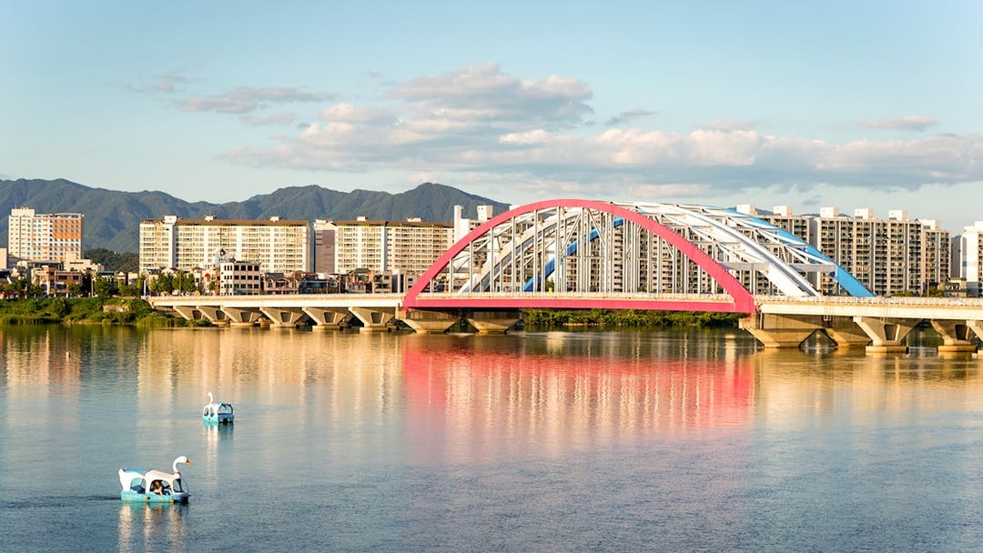 Soyang 2 Bridge over Chuncheon Lake with swan boats, Chuncheon, Korea.