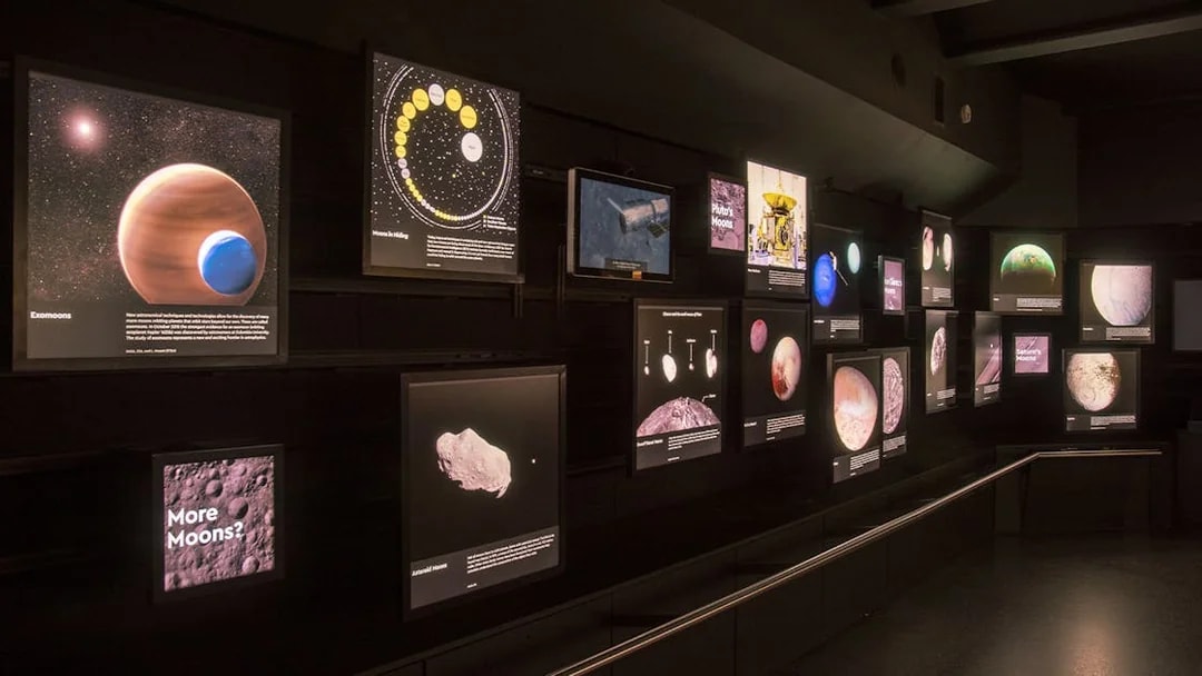 Exhibit of celestial bodies and space exploration at Royal Observatory Planetarium Gallery.